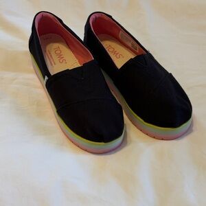 TOMS Kids Black Canvas Slip-On with Rainbow Layered Sole